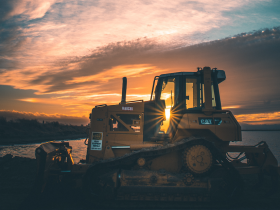Bulldozer in sunset