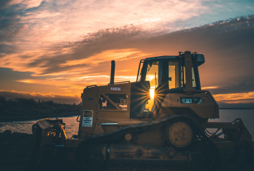 Bulldozer in sunset