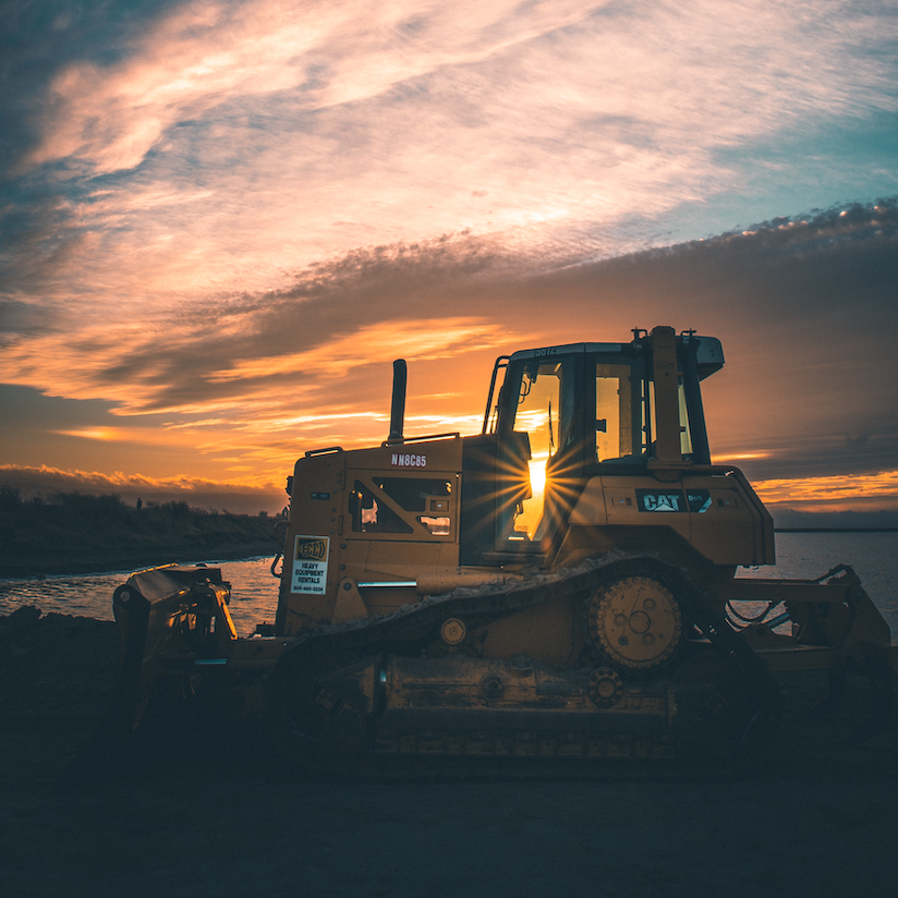 Bulldozer in sunset